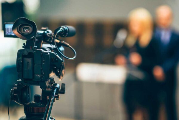 Media professionals being filmed
